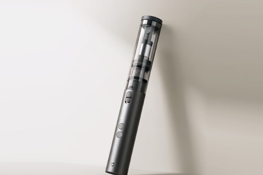 The sleek Xiaomi Mijia Car Vacuum Cleaner Portable Edition stands against a light background.