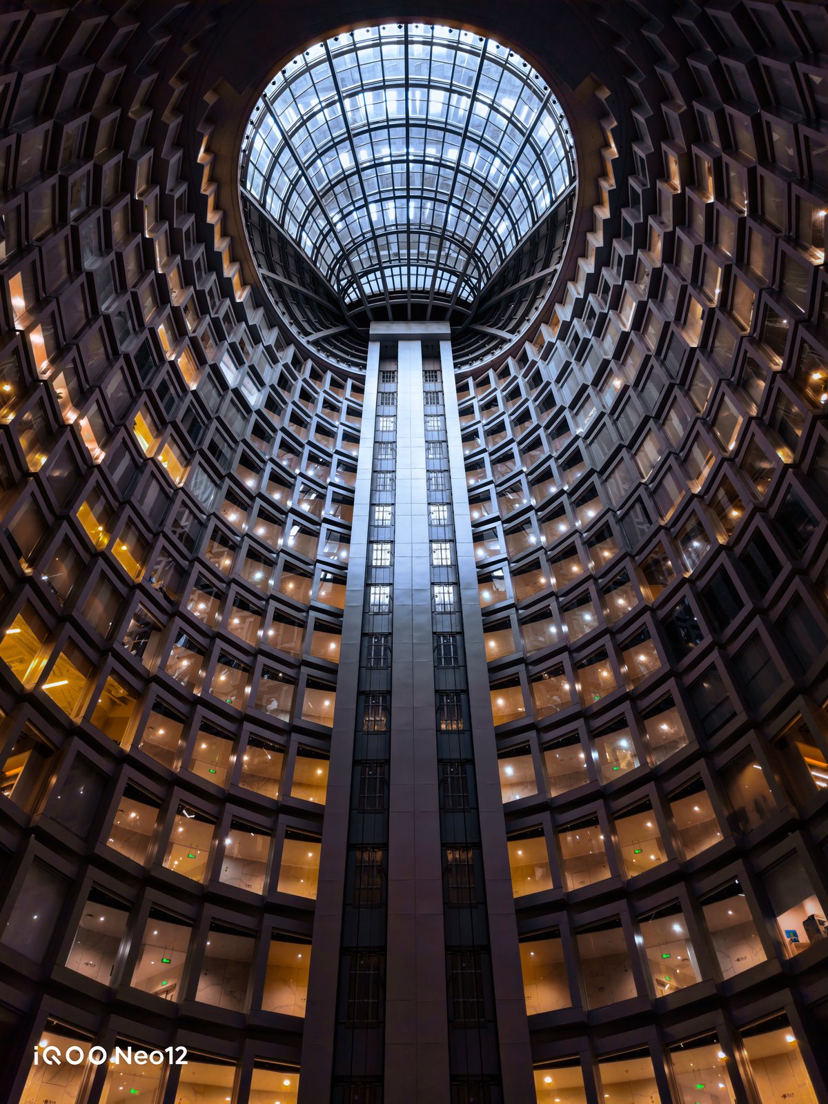 iQOO Neo 12 camera sample showing an upward view of a building atrium with a glass dome